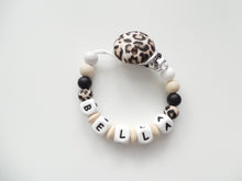 Load image into Gallery viewer, Matching set Dummy clip and Teething rattle toy - Wild Leopard print
